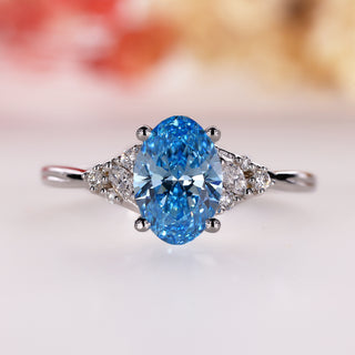 Oval diamond engagement ring set in muse setting.
