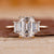 Three stone emerald cut ring with emerald diamond ring.
