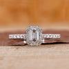 Emerald cut engagement ring with halo engagement ring.
