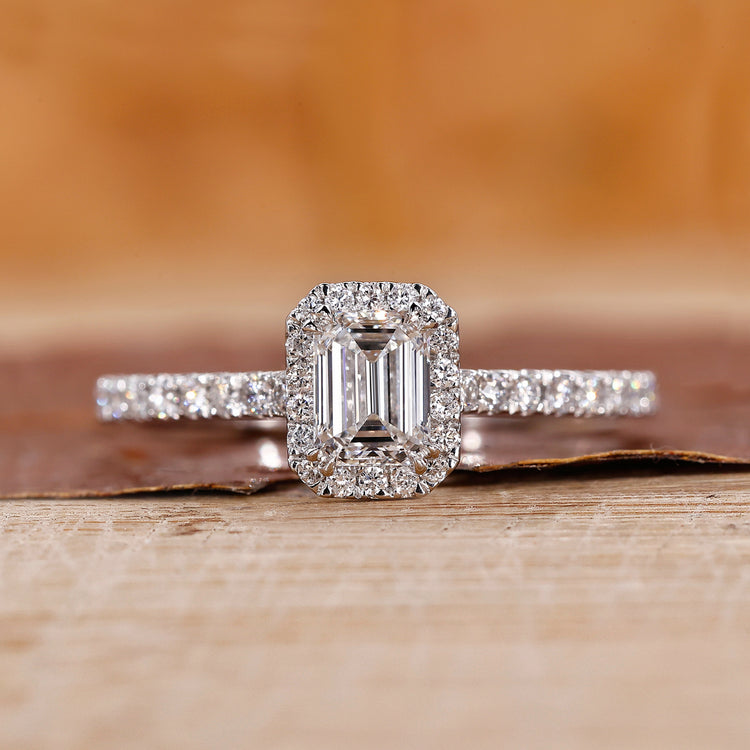 Emerald cut engagement ring with halo engagement ring.

