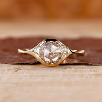 Bezel set diamond ring in yellow gold ring
