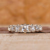 French cut diamond band in yellow gold.