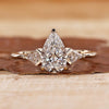 3 Stone Diamond Engagement Ring with pear cut diamond ring.
