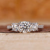 3 stone diamond engagement ring with tapered pave engagement ring.
