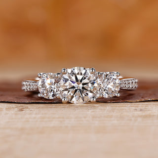 3 stone diamond engagement ring with tapered pave engagement ring.
