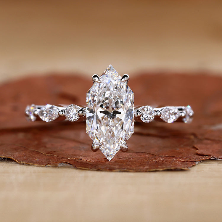 dutch marquise engagement ring in white gold band.

