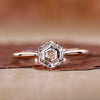 cathedral setting engagement ring in yellow gold ring.
