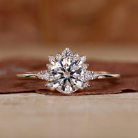 round diamond ring in yellow gold band.
