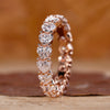 Heart shaped diamond band with prong setting.