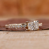 East to west setting in radiant cut engagement ring.
