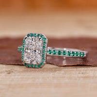 Round emerald pave ring with radiant cut diamond in a white gold claw prong setting.
