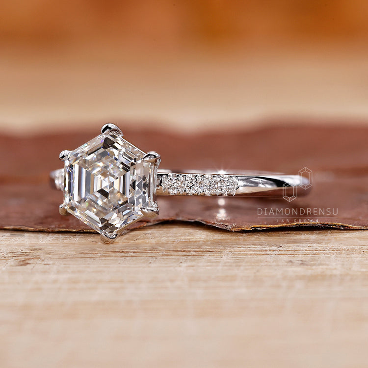 round cut side stones on pave setting ring.
