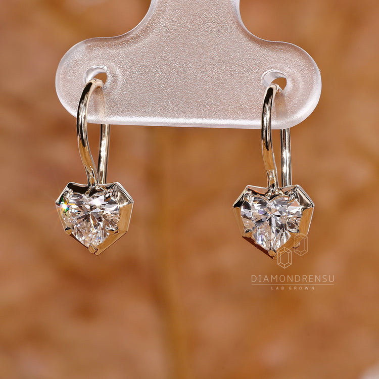 Simple heart diamond earrings for daily wear.
