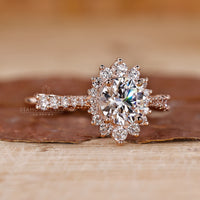 Halo ring setting featured in a round diamond ring.
