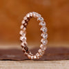 Eternity Wedding Band with round rose cut diamonds in shared prong setting.
