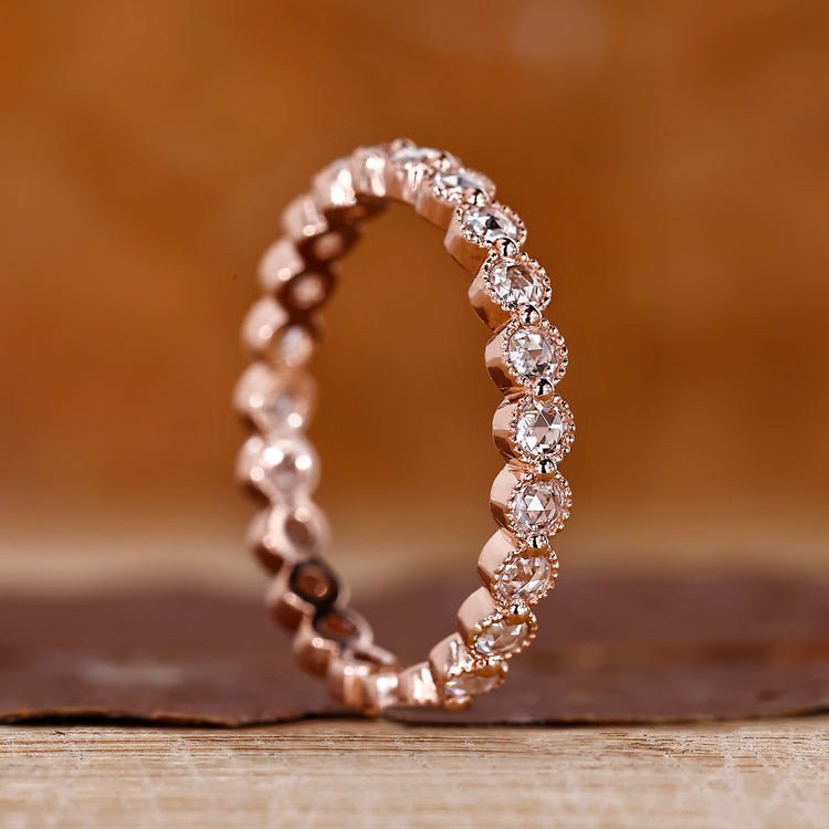 Eternity Wedding Band with round rose cut diamonds in shared prong setting.
