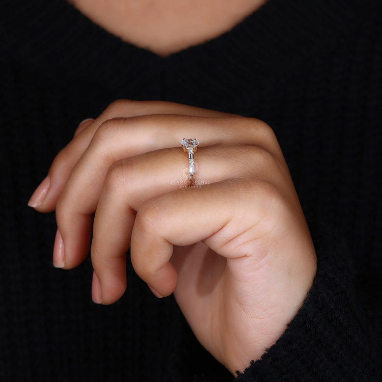 Handmade oval diamond ring in custom 4-prong setting.
