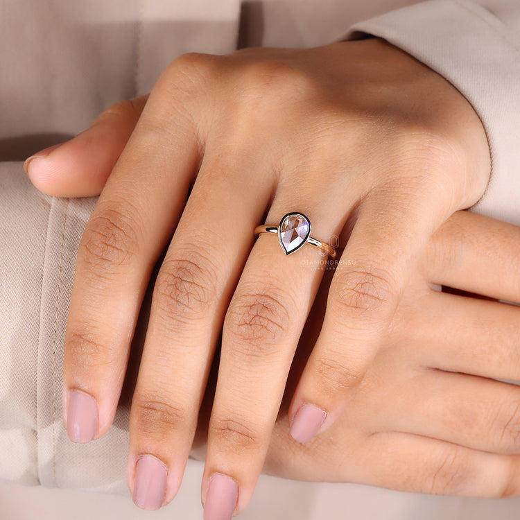 Rose cut diamond ring with bezel set in gold.