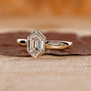 Bezel set ring with hexagon cut diamond.
