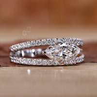 East west marquise engagement ring in white gold.
