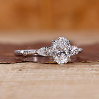 4 claw prong setting on custom diamond ring.
