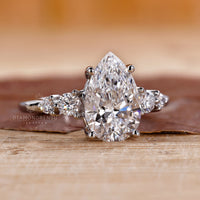 Prong setting ring with a custom diamond design and lab grown centre.
