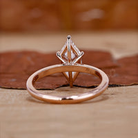 simple engagement ring in hexagon step cut style.
