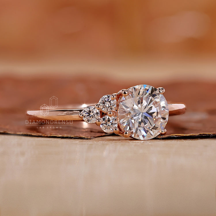 4 prong setting on asymmetrical engagement ring.
