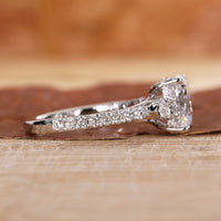 Trellis setting ring designed in white gold ring.
