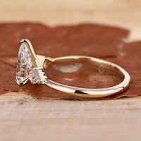 3 claw prong setting ring crafted in yellow gold ring.
