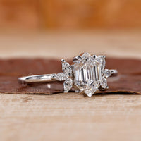 marquise side stones set in hexagon diamond engagement ring.
