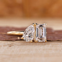 2 stone diamond ring and emerald and pear cut ring.
