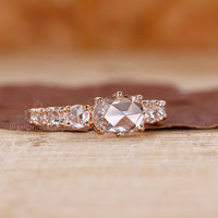 Custom diamond ring with rose cut diamonds in rose gold.
