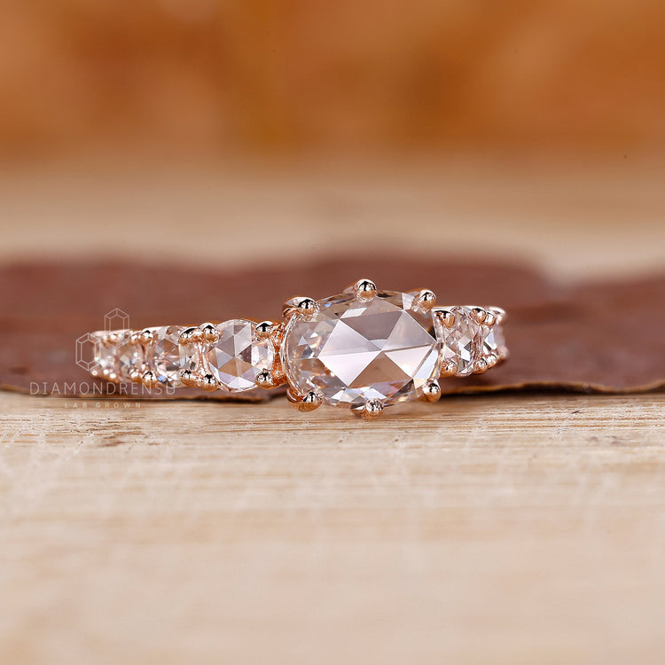 Custom diamond ring with rose cut diamonds in rose gold.
