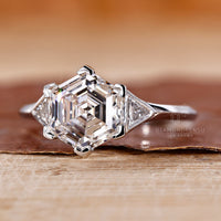 Knife edge shank band with hexagon engagement ring.
