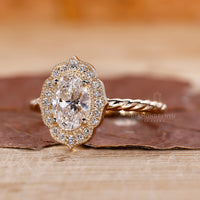 Vintage engagement ring with oval gold engagement ring.
