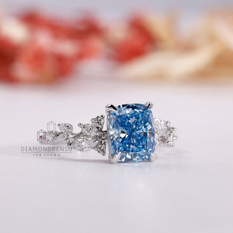 Side stones ring with accent diamonds for extra brilliance.
