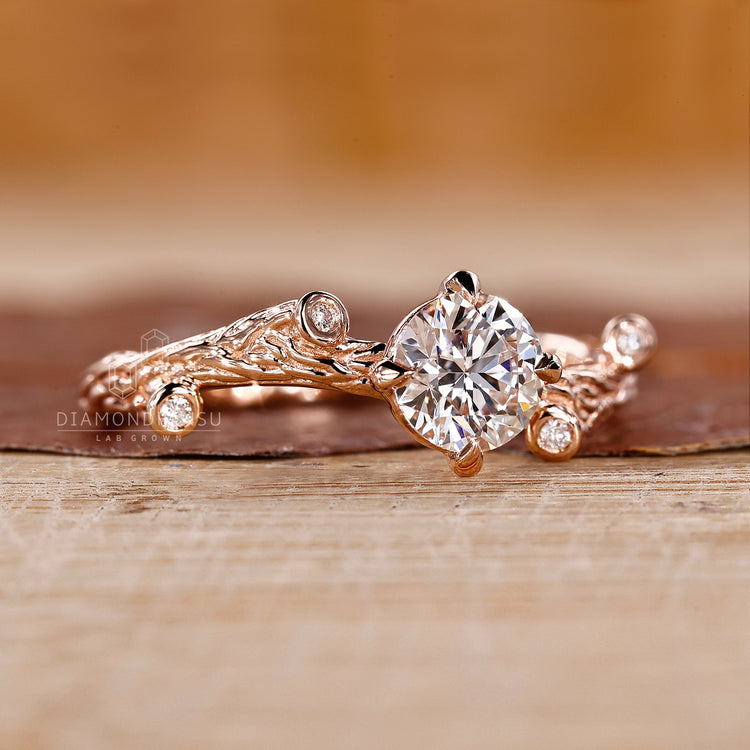 Four claw prong setting ring with round cut lab grown diamond.
