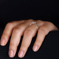 Round cut twisted pavé band crafted for brilliance.
