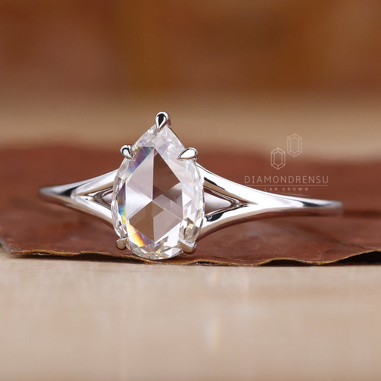 White gold engagement ring in claw prong setting.

