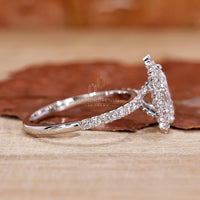 pave setting engagement ring with pear shaped diamond.
