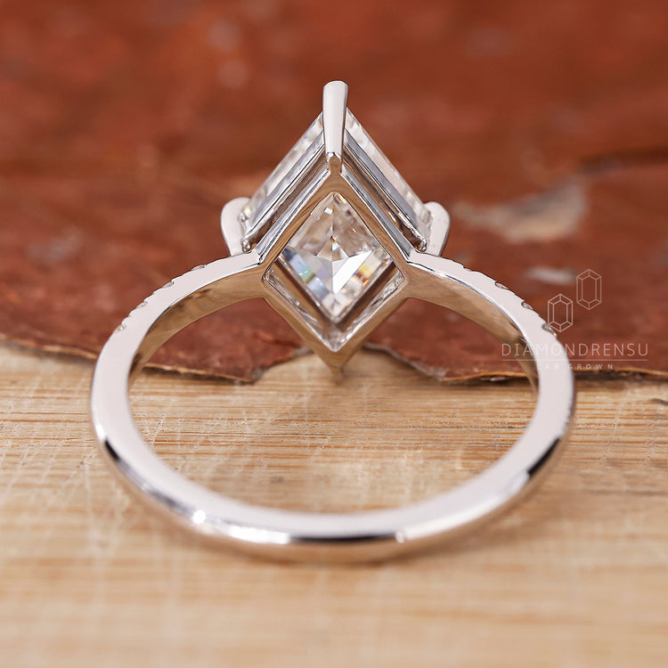 Customise ring using lozenge cut engagement ring.
