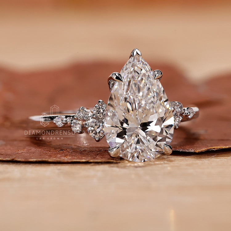 V prong setting ring paired with 4 prong claw setting.
