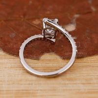 Custom diamond ring designed with emerald centre and IGI certified stones.
