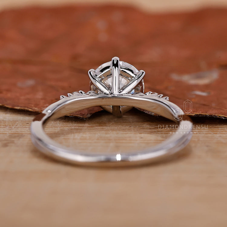Six round prong setting diamond ring


