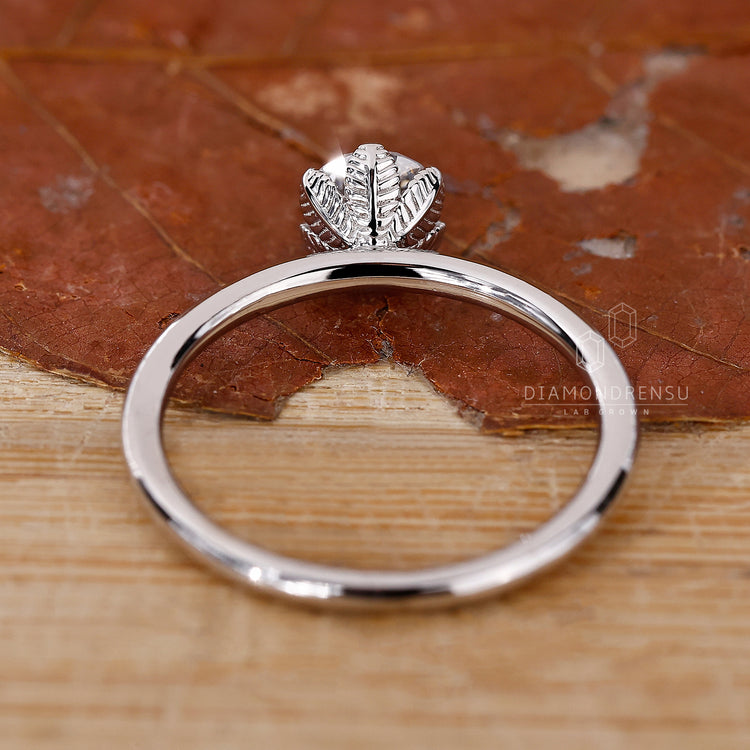 simple diamond ring in solitaire engagement ring style.
