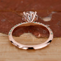 Rose gold ring with pavé setting and round cut lab grown diamond.
