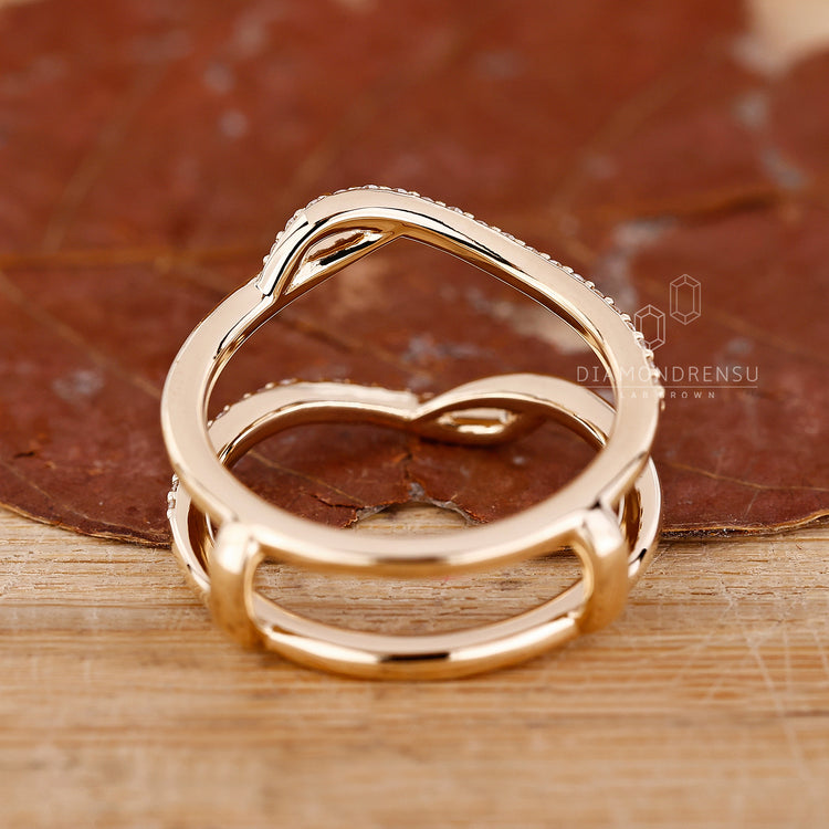 Unique wedding band and round diamond wedding band.
