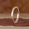 Double row diamond band with brilliant round cut stones.
