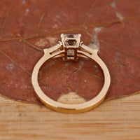 Buy Engagement ring with emerald cut design.
